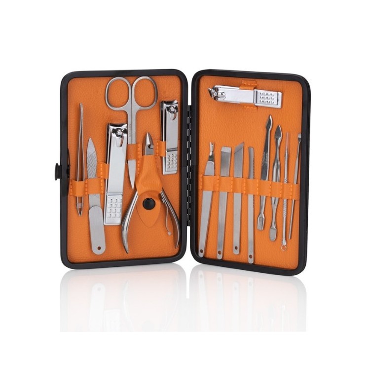 Set mit 15 Kosmetikaccessoires für manicure , pedicure und Gesichtsbehandlungen in einem schwarz-braunen Etui